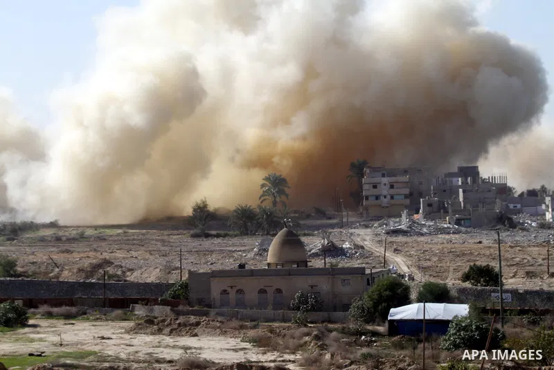 Smoke rises after a house was blown up during a military operation by Egyptian security forces in the Egyptian city of Rafah near the border with southern Gaza Strip on November 20, 2014. Egypt is set to expand the buffe...