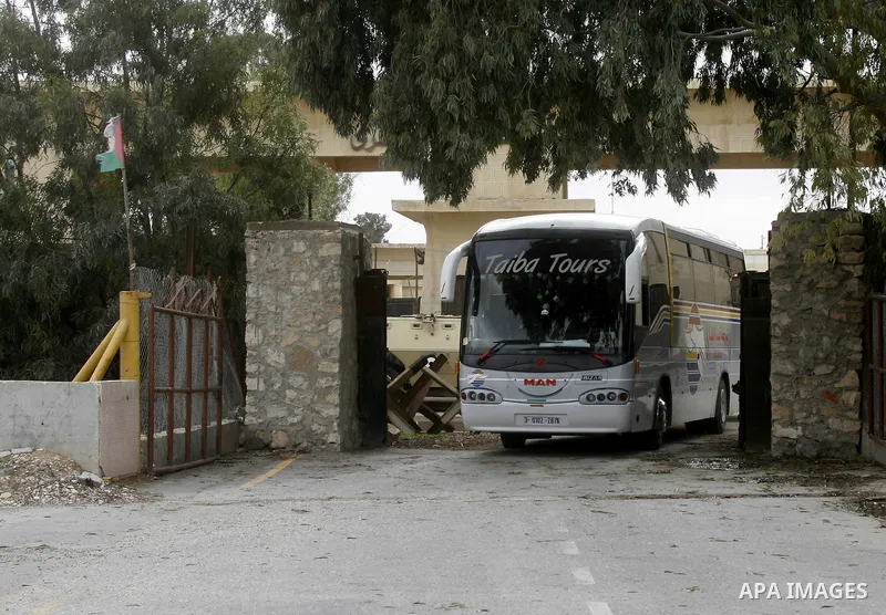 A bus carrying Palestinians returning to Gaza, arrives at the Rafah border crossing between Egypt and southern Gaza Strip November 26, 2014. Egypt reopened the Rafah crossing with Gaza, which is the only access point to...