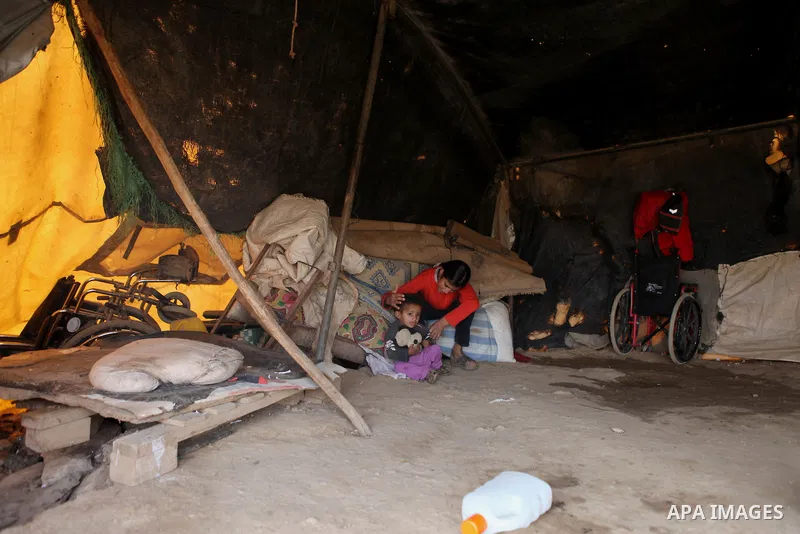 Bedouin children play at their family's dwellings in the Jordan Valley near West Bank city of Jericho on November 29, 2014. Photo by Shadi Hatem