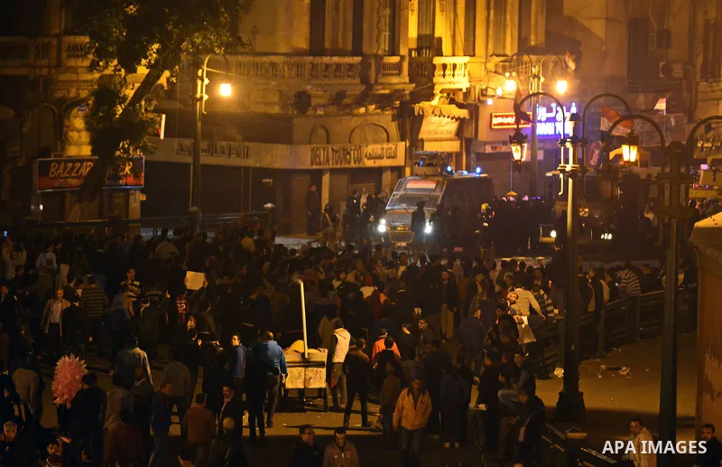 Egyptian anti-Mubarak protesters clash with riot police at Abdel Moneim Riad, a main transportation hub for taxis and buses, after hearing the verdict of former Egyptian president Hosni Mubarak, in Cairo, Egypt, 29 Novem...
