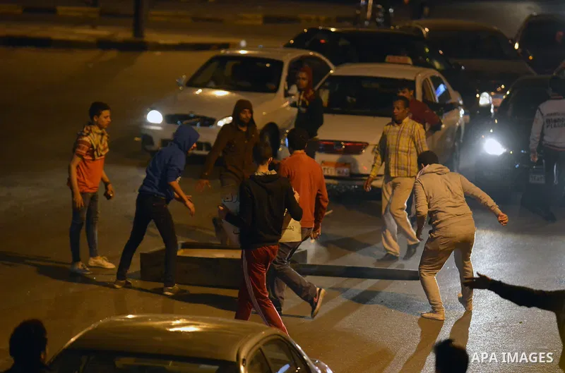 Egyptian anti-Mubarak protesters gather at Abdel Moneim Riad, a main transportation hub for taxis and buses, after hearing the verdict of former Egyptian president Hosni Mubarak, in Cairo, Egypt, 29 November 2014. An Egy...