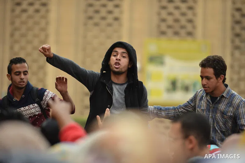 Egyptian anti-Mubarak students chant slogans one day after a court dismissed murder charges against former president Hosni Mubarak at Cairo University, Egypt, 30 November 2014. Two people were killed in clashes between p...