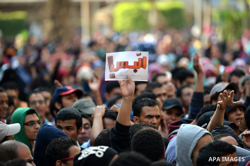 Egyptian student who support Muslim Brotherhood and ousted president Mohammed Mursi, take part in a protest one day after a court dismissed murder charges against former president Hosni Mubarak at Cairo University, Egypt...