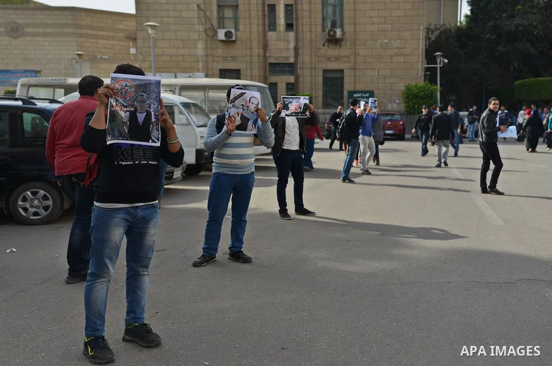 Egyptian students who support Muslim Brotherhood and ousted president Mohammed Morsi, take part in a demonstration to demand for release the detained students, at Cairo University, in Cairo, Dec. 02, 2014. Photo by Amr S...