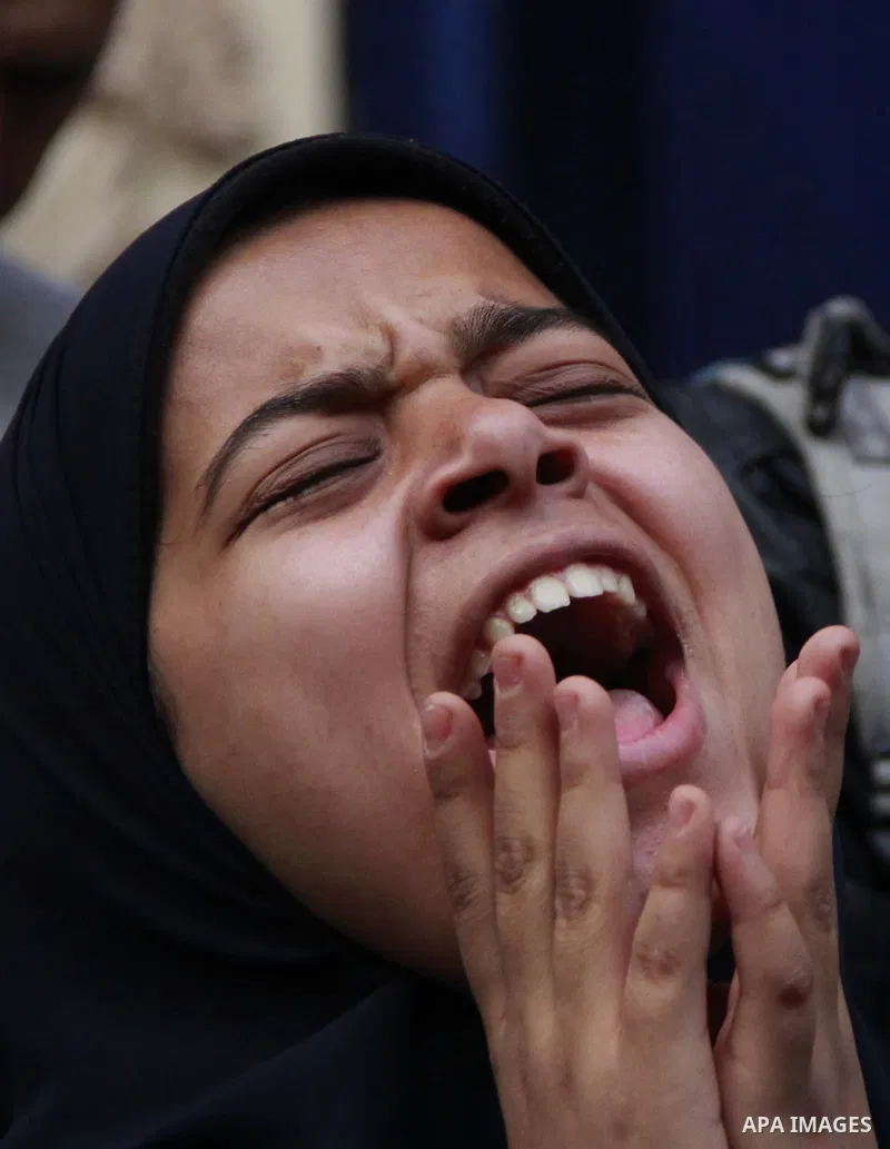 Egyptians chant slogans during a protest denouncing toppled President Hosni Mubarak in front of the press syndicate in Cairo, Egypt, Tuesday, Dec. 2, 2014. A judge on Saturday dismissed the case against Mubarak and acqui...