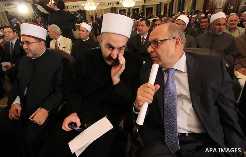 Muslim scholars and popes of eastern churches attend the conference "Azhar in the face of terrorism and extremism" in Cairo, December 3, 2014. Grand Imam of Egypt s al-Azhar Institution Ahmed al-Tayeb addressed a two-day...