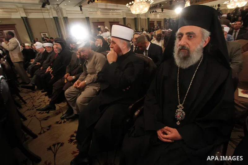Muslim scholars and popes of eastern churches attend the conference "Azhar in the face of terrorism and extremism" in Cairo, December 3, 2014. Grand Imam of Egypt s al-Azhar Institution Ahmed al-Tayeb addressed a two-day...