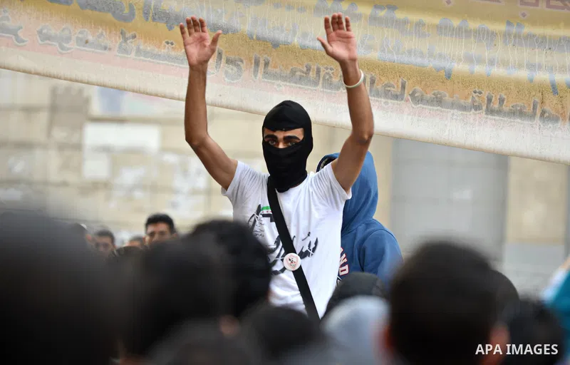 Egyptian students who are members in Students Against the Coup group (SAC), take part in a demonstration against the Cairo Criminal Court's decision to drop charges against former president Hosni Mubarak, at Cairo Univer...