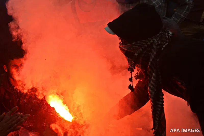 Egyptian students who are members in Students Against the Coup group (SAC), take part in a demonstration against the Cairo Criminal Court's decision to drop charges against former president Hosni Mubarak, at Cairo Univer...