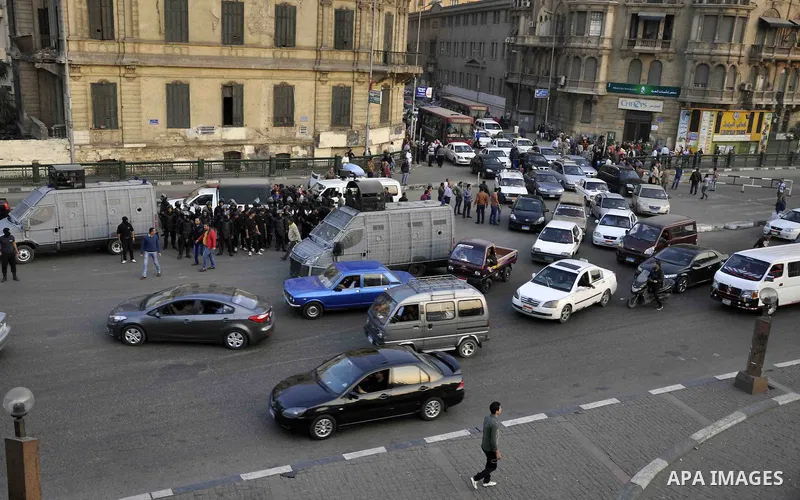 Egyptian police deploy on Abdel Moneim Riad Square in the capital Cairo on December 5, 2014, during a demonstration against a court's decision to drop a murder charge against ousted president Hosni Mubarak. A Cairo court...