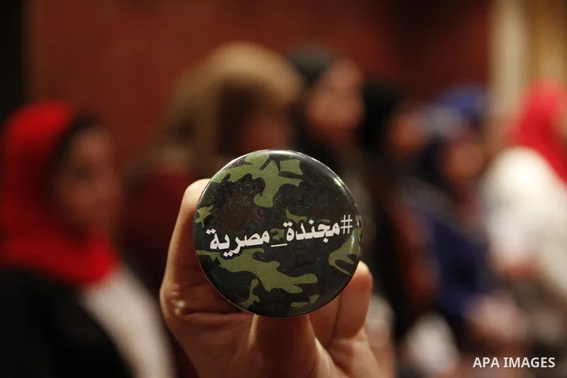 Egyptian women attend a meeting to demand the conscription, during a campaign "an Egyptian soldier" in Cairo, Egypt, on December 5, 2014. Photo by Amr Sayed