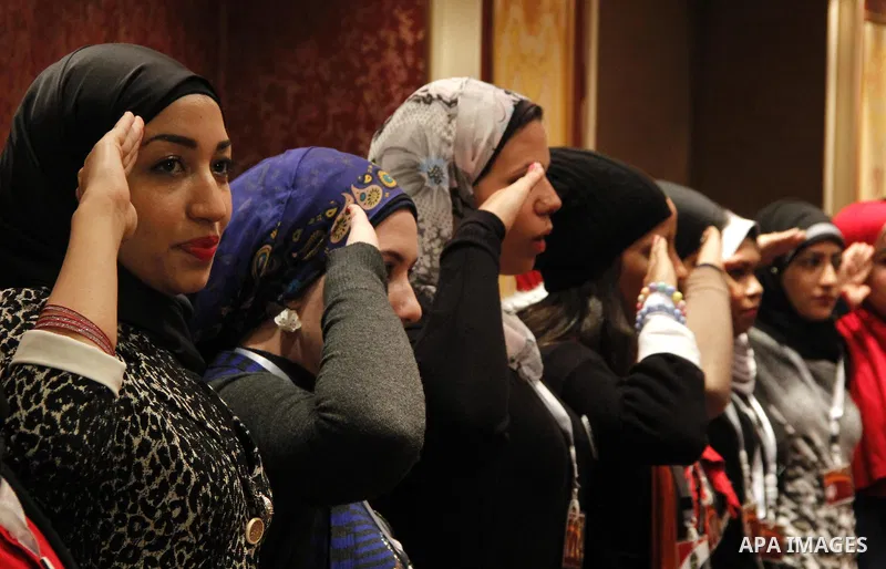 Egyptian women attend a meeting to demand the conscription, during a campaign "an Egyptian soldier" in Cairo, Egypt, on December 5, 2014. Photo by Amr Sayed