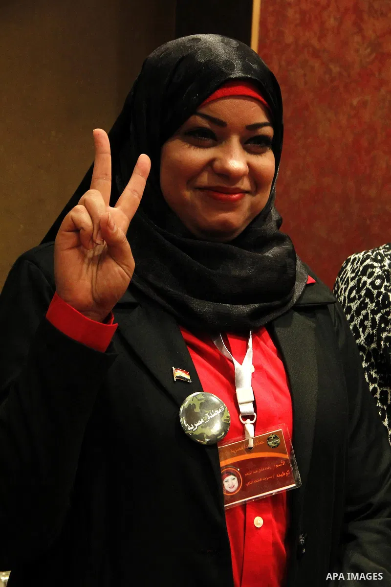 Egyptian women attend a meeting to demand the conscription, during a campaign "an Egyptian soldier" in Cairo, Egypt, on December 5, 2014. Photo by Amr Sayed