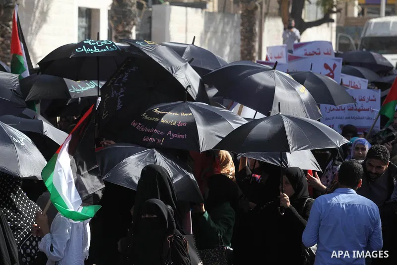 Palestinian women take part in a demonstration to mark the International Day of Human Rights, in Gaza City on December 10, 2014. The Palestinians are seeking a UN resolution by year-end that would set a timetable for Isr...