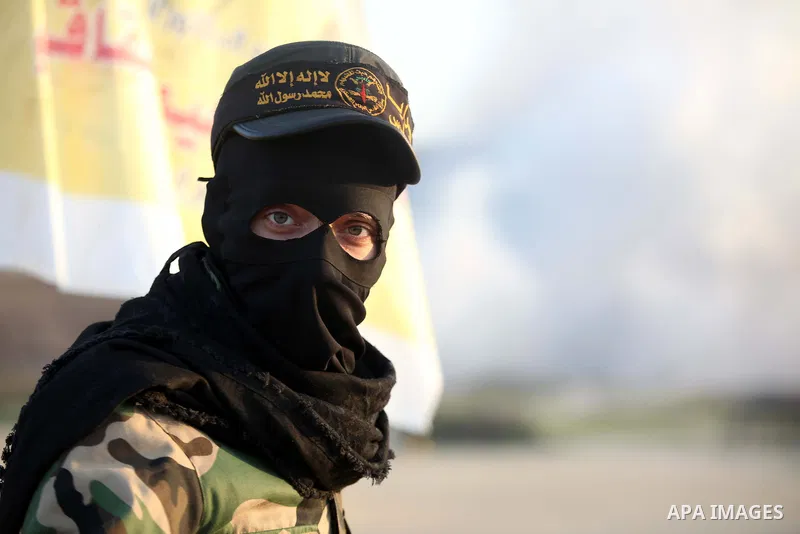A Palestinian militant from the al-Quds brigade, the armed wing of Islamic Jihad movement, takes part in a training exercise, in Nuseirat, in the center of Gaza Strip, December 11, 2014. Hamas says a senior U.N. envoy he...