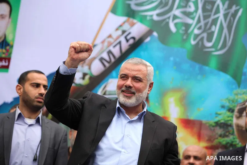 Senior Hamas leader Ismail Haniyeh, takes part in a rally ahead of the 27th anniversary of the movement founding, in Jabaliya in the northern Gaza Strip December 12, 2014. Photo by Ashraf Amra