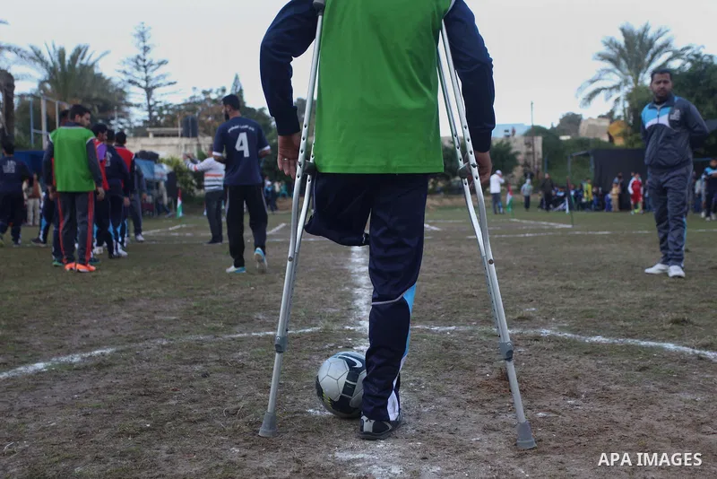 Palestinians disabled participate in an athletics championship for disabled, at Al-Jazeera Club in Gaza city on December 20, 2014. Photo by Ashraf Amra