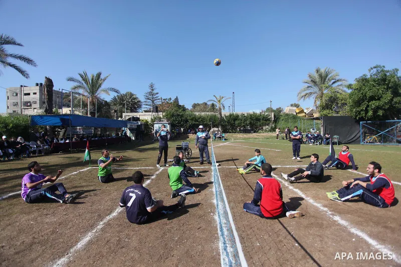 Palestinians disabled participate in an athletics championship for disabled, at Al-Jazeera Club in Gaza city on December 20, 2014. Photo by Ashraf Amra