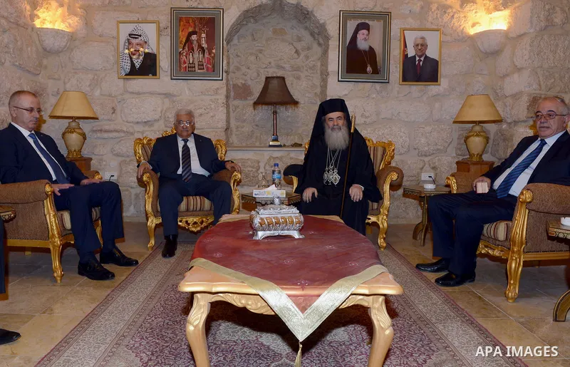 Palestinian President Mahmoud Abba meets wit mass range Anglicans, in the West Bank city of Bethlehem December 24, 2014. Photo by Thaer Ganaim