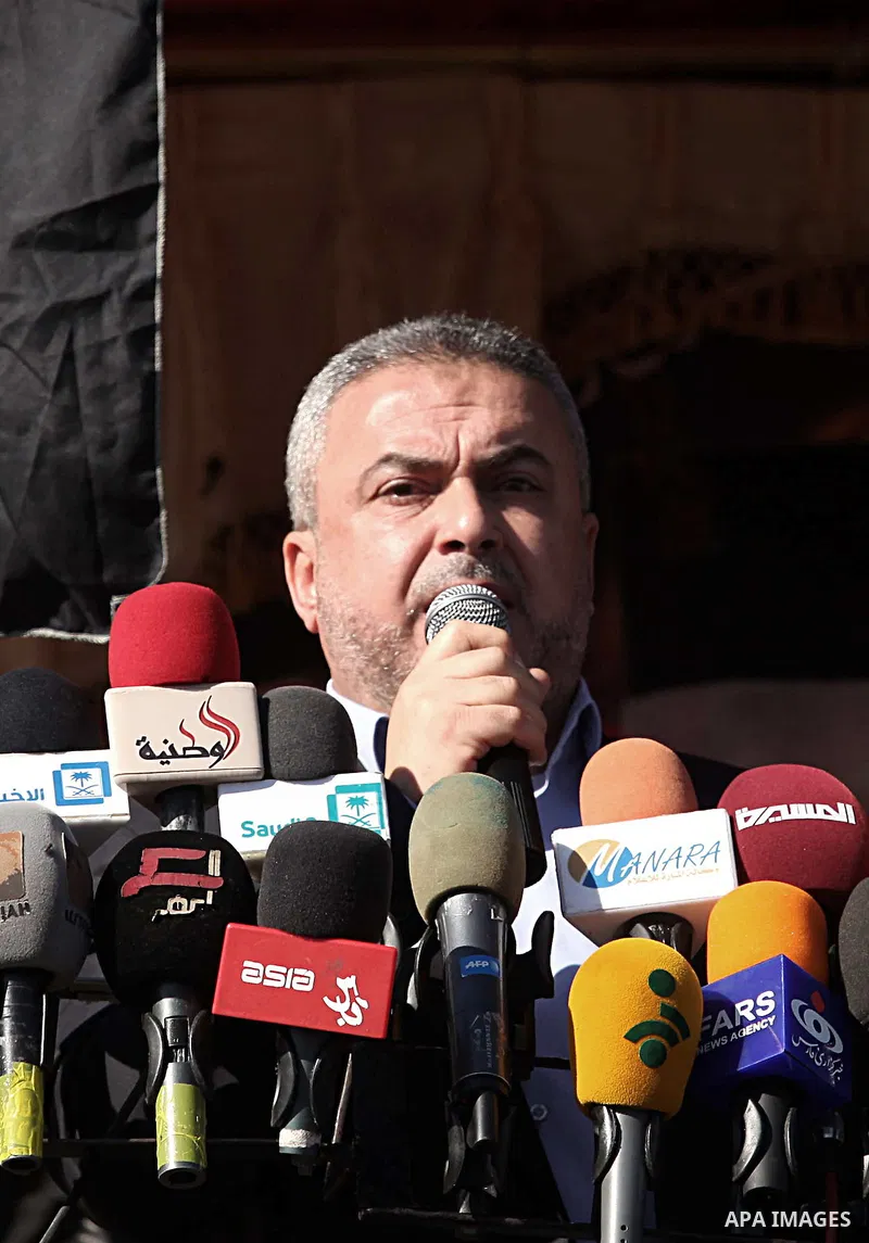 Senior Hamas leader Ismail Radwan, speaks during a protest calling for end the Israeli illegal blockade on Gaza Strip and against the slow rehabilitation of the strip after damage incurred during the recent Israeli offen...