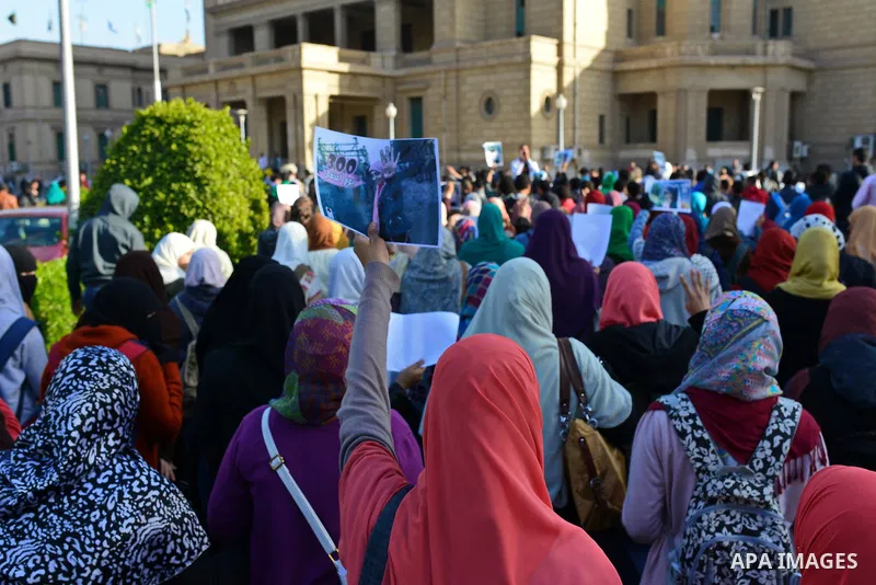 Egyptian supporters of Muslim Brotherhood who belonged to "Students against Coup" movement participate in a demonstration to demand the release of their detained colleagues, outside the Cairo University, Cairo December 2...