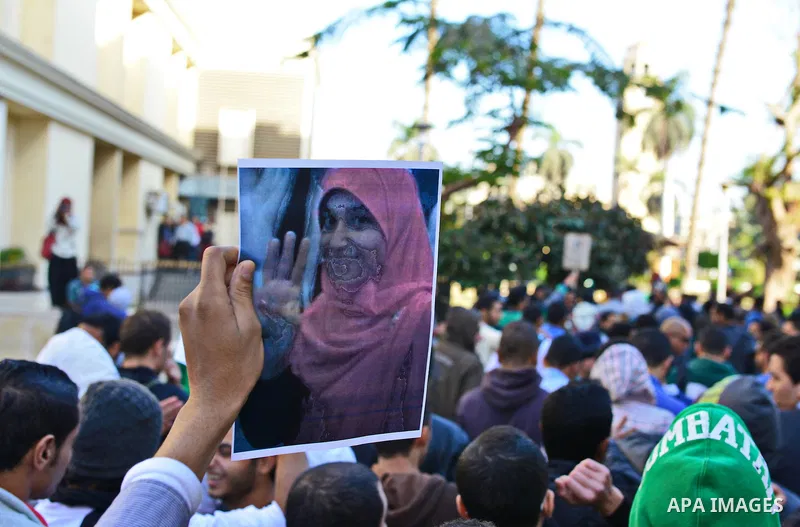 Egyptian supporters of Muslim Brotherhood who belonged to "Students against Coup" movement participate in a demonstration to demand the release of their detained colleagues, outside the Cairo University, Cairo December 2...