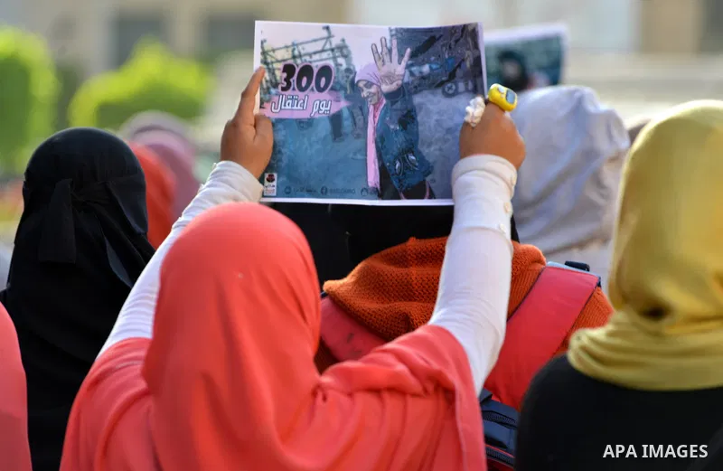 Egyptian supporters of Muslim Brotherhood who belonged to "Students against Coup" movement participate in a demonstration to demand the release of their detained colleagues, outside the Cairo University, Cairo December 2...