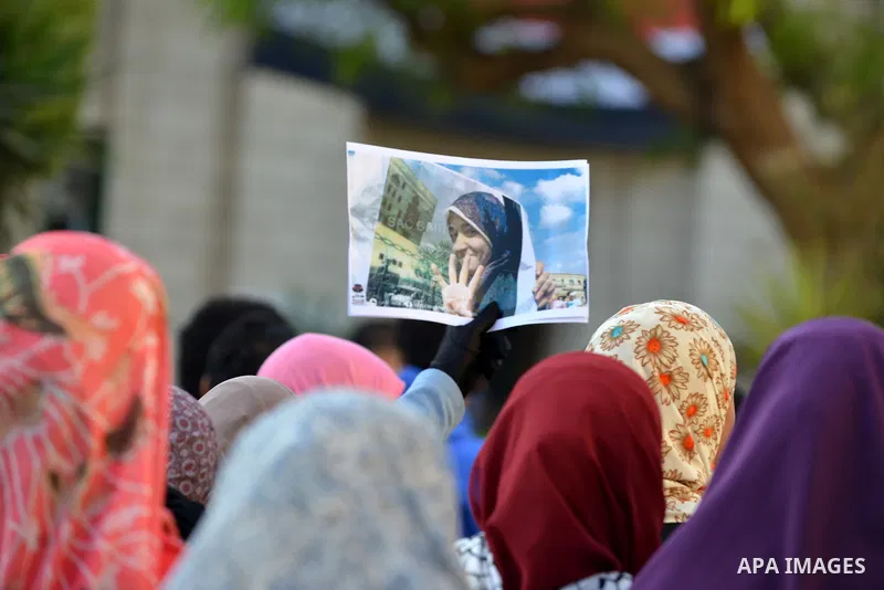 Egyptian supporters of Muslim Brotherhood who belonged to "Students against Coup" movement participate in a demonstration to demand the release of their detained colleagues, outside the Cairo University, Cairo December 2...