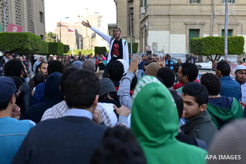 Egyptian supporters of Muslim Brotherhood who belonged to "Students against Coup" movement participate in a demonstration to demand the release of their detained colleagues, outside the Cairo University, Cairo December 2...