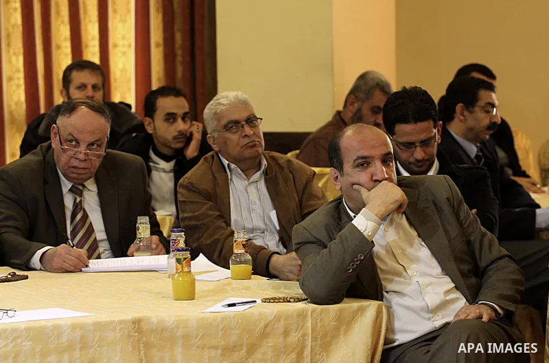 Senior Hamas leader Mousa Abu Marzouk, meets with members of civil society organizations and Palestinian factions, in Gaza city on December 28, 2014. Photo by Mohammed Asad