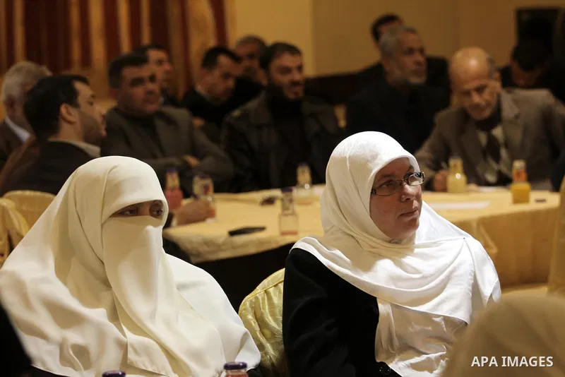 Senior Hamas leader Mousa Abu Marzouk, meets with members of civil society organizations and Palestinian factions, in Gaza city on December 28, 2014. Photo by Mohammed Asad