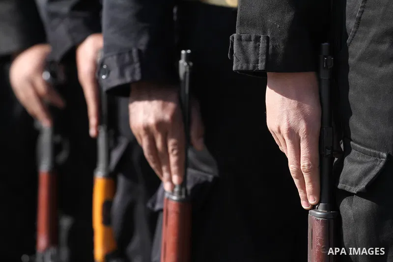 Palestinian members of national security forces march during a military rally to commemorated the sixth anniversary of the beginning of Israel's 22-day offensive on the Gaza Strip in 2008-9 that left more than 1,400 dead...
