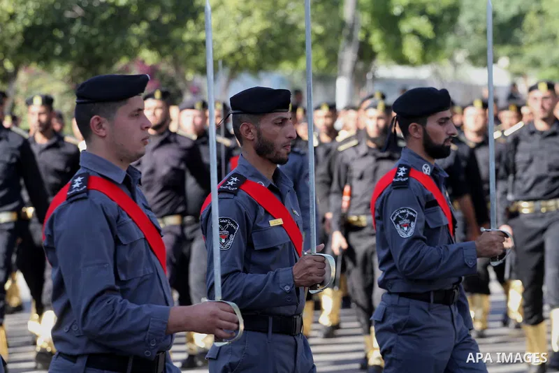 Palestinian members of national security forces march during a military rally to commemorated the sixth anniversary of the beginning of Israel's 22-day offensive on the Gaza Strip in 2008-9 that left more than 1,400 dead...