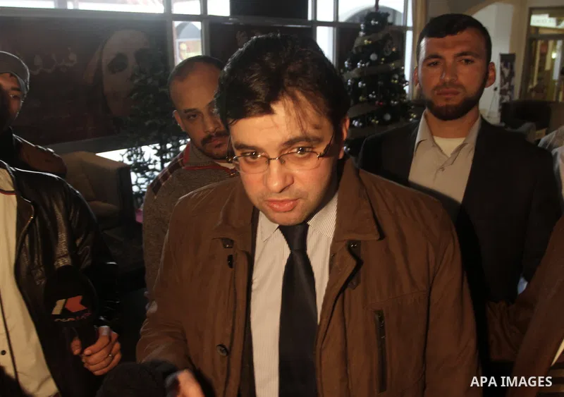 Spokesman of Palestinian unity government Ehab Bsaiso, speaks to media upon arrival to the Gaza Strip, in Gaza city on December 29, 2014. Around 50 Palestinian unity government officials, including eight ministers, arriv...