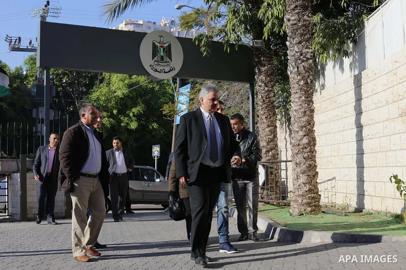 Palestinian Deputy Prime Minister Ziad Abu-Amr arrives the headquarters of Council of ministers, in Gaza city, on December 30, 2014. Around 50 Palestinian unity government officials, including eight ministers, arrived in...