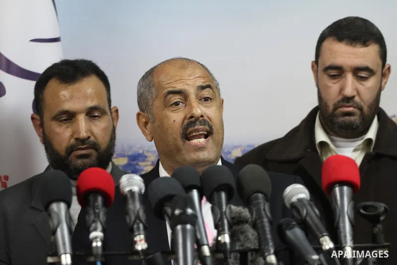 Former head of the union staff in Gaza, Mohammed Siam speaks during a press conference in Gaza city, on December 31, 2014. Photo by Mohammed Asad