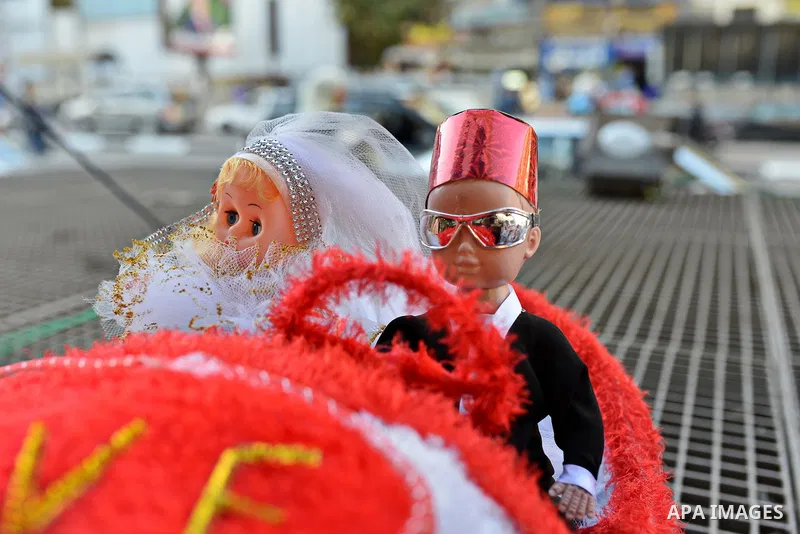 Doll toys are displayed at a shop in preparation to celebrate the birthday of prophet Muhammad, also known as "Mawlid Nabawi", which will fall next week, in Cairo, December 31, 2014. Photo by Amr Sayed