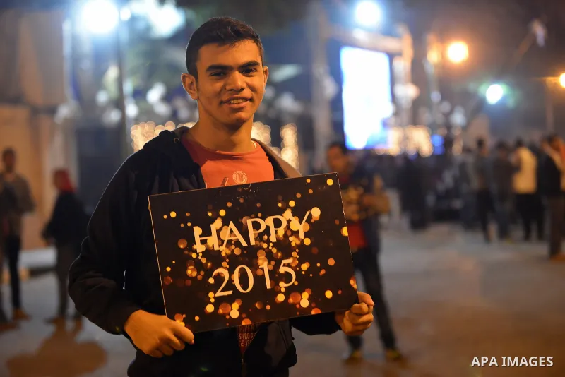 An Egyptian Christian celebrates of Christmas and New Year festivities, in Cairo on December 31, 2014. Photo by Amr Sayed