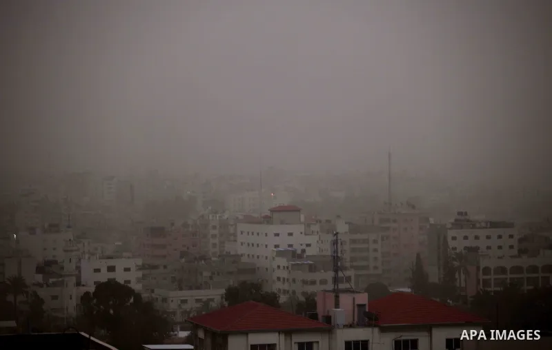 A general view shows the Gaza city during a heavy storm, on January 6, 2015. Several countries in the Middle East are bracing for cold weather this week, with snow storm "Huda," also called "Zina," expected to hit parts...