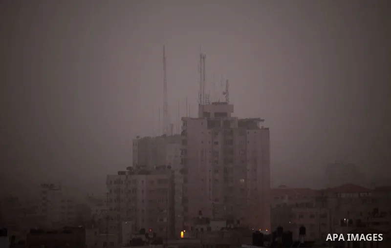 A general view shows the Gaza city during a heavy storm, on January 6, 2015. Several countries in the Middle East are bracing for cold weather this week, with snow storm "Huda," also called "Zina," expected to hit parts...