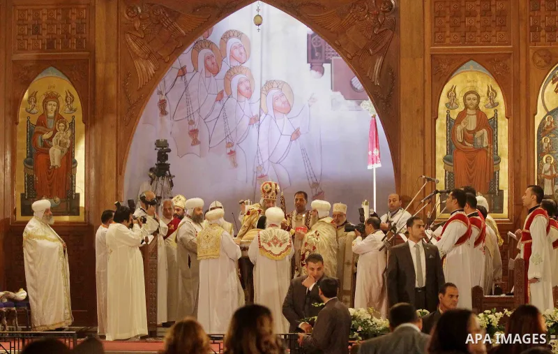Coptic Pope Tawadros II gives his blessings during the Coptic Christmas Eve mass at the Saint Mark's Coptic Orthodox Cathedral in Cairo, capital of Egypt, on Jan 6, 2015. Coptic Pope Tawadros II, head of Coptic Orthodox...
