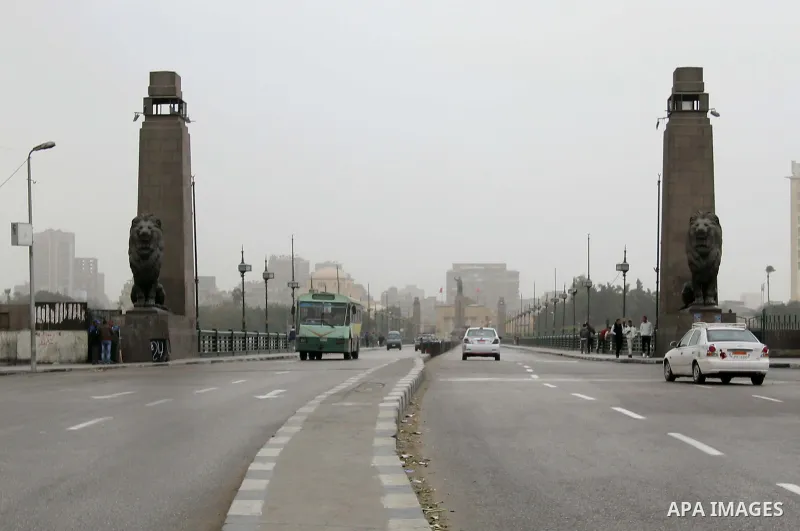 Egyptians ride cars at a streets during a sandstorm in the city of Cairo January 7, 2015. Several countries in the Middle East are bracing for cold weather this week, with snow storm "Huda," also called "Zina," expected...