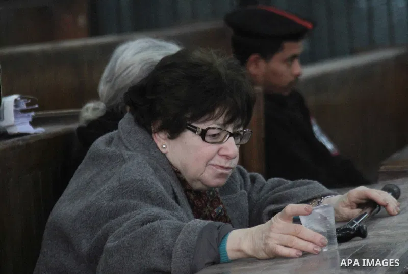 Relatives and friends attend the retrial of Alaa Abdel Fattah and 24 others, in the courtroom in Cairo on January 17, 2015. The defendants were sentenced in June to 15 years in prison for holding an unlicensed and violen...
