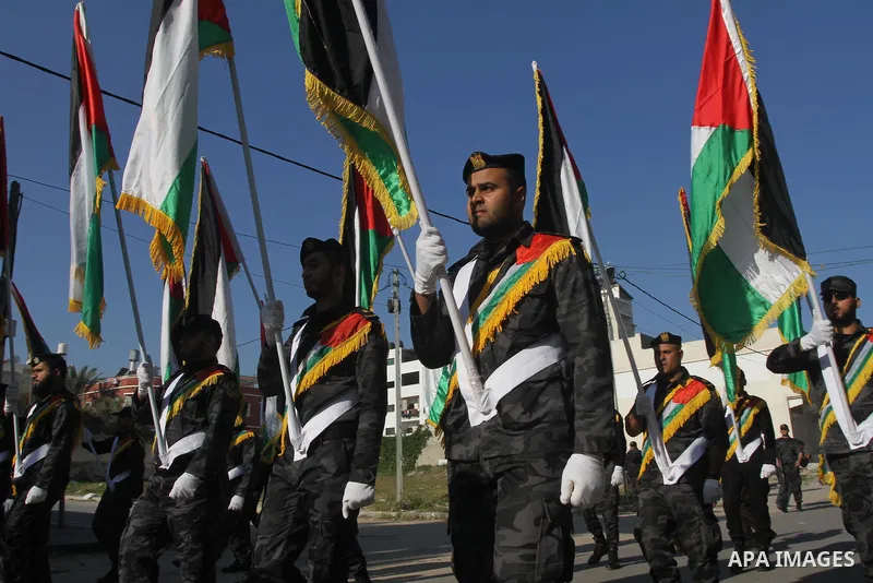 Palestinian members of the National Security forces march during a military parade to mark the anniversary of late the former interior minister, Said Siyam, in Gaza City, January 18, 2015. Photo by Mohammed Asad