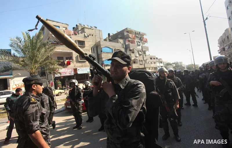 Members of Palestinian security forces loyal to Hamas take part in a parade marking the sixth anniversary of the death of former Hamas interior minister Saeed Seyam, in Gaza City January 18, 2015. Seyam was killed by an...