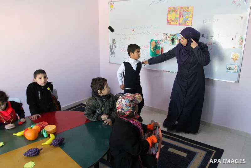 Deaf Palestinian children study in a foundation for rehabilitation deaf children, in Khan Younis in the southern Gaza Strip, January 18, 2015. There are approximately 25,000 deaf and hearing impaired people in the Gaza S...