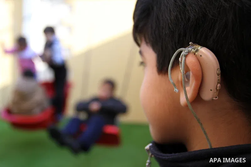 Deaf Palestinian children play in a foundation for rehabilitation deaf children, in Khan Younis in the southern Gaza Strip, January 18, 2015. There are approximately 25,000 deaf and hearing impaired people in the Gaza St...