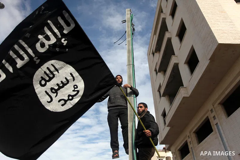 Palestinian Salafists wave flags during in a protest against satirical French weekly magazine Charlie Hebdo's cartoons of the Prophet Mohammad, outside the French Cultural Centre in Gaza city January 19, 2015. Dozens of...