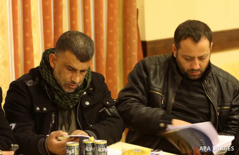 Palestinians attend the ceremony of a newly published book " The Path of Thorns," written by Palestinian prisoner Saleem Hejja, in Gaza city on January 20, 2015. Photo by Mohammed Asad