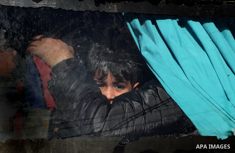 Palestinians, hoping to cross into Egypt, wait for a travel permit at the Rafah crossing between Egypt and the southern Gaza Strip January 22, 2015. Egyptian authorities opened the Rafah border crossing on Tuesday for th...
